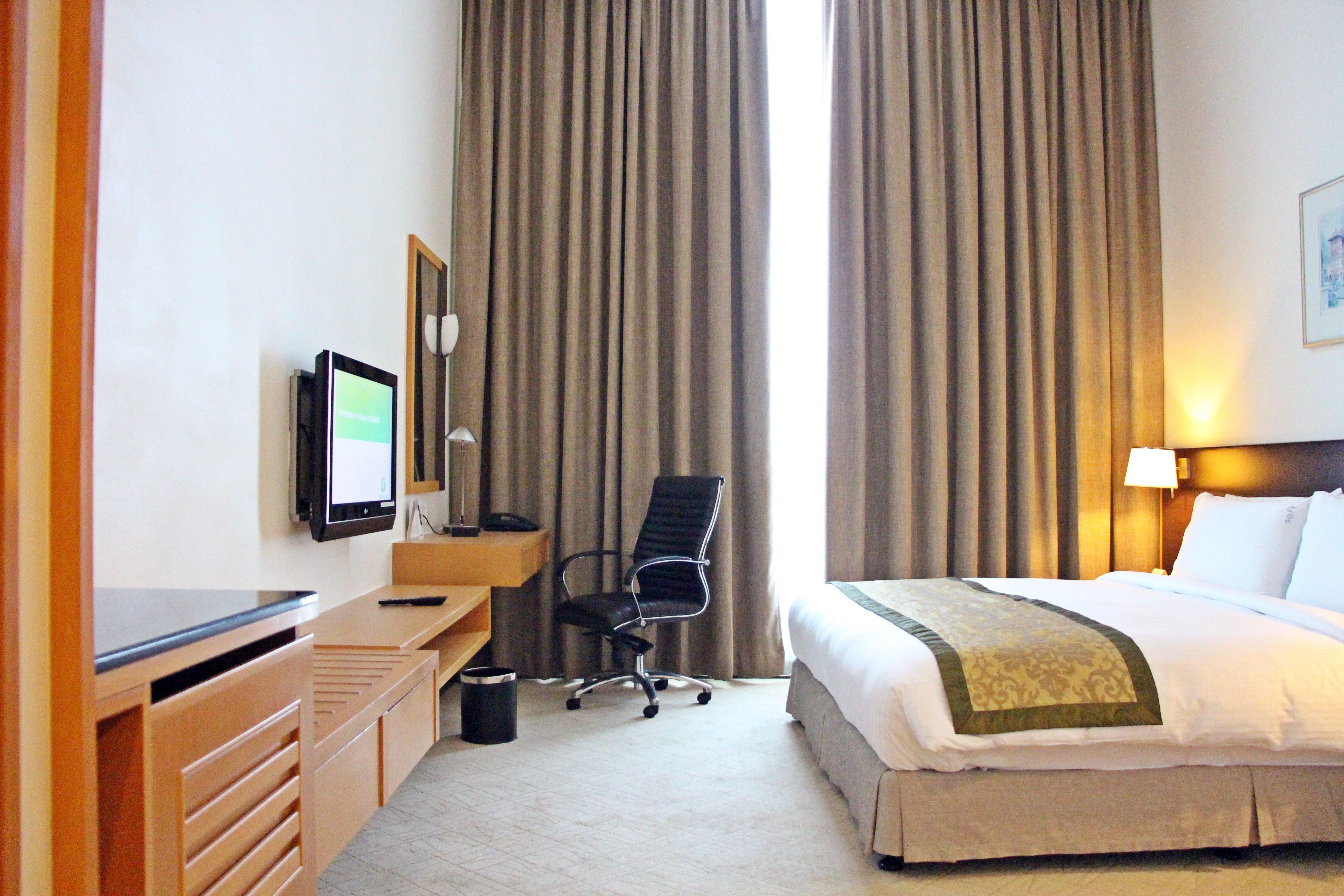 Holiday Inn Melaka By Ihg Esterno foto A room at the hotel