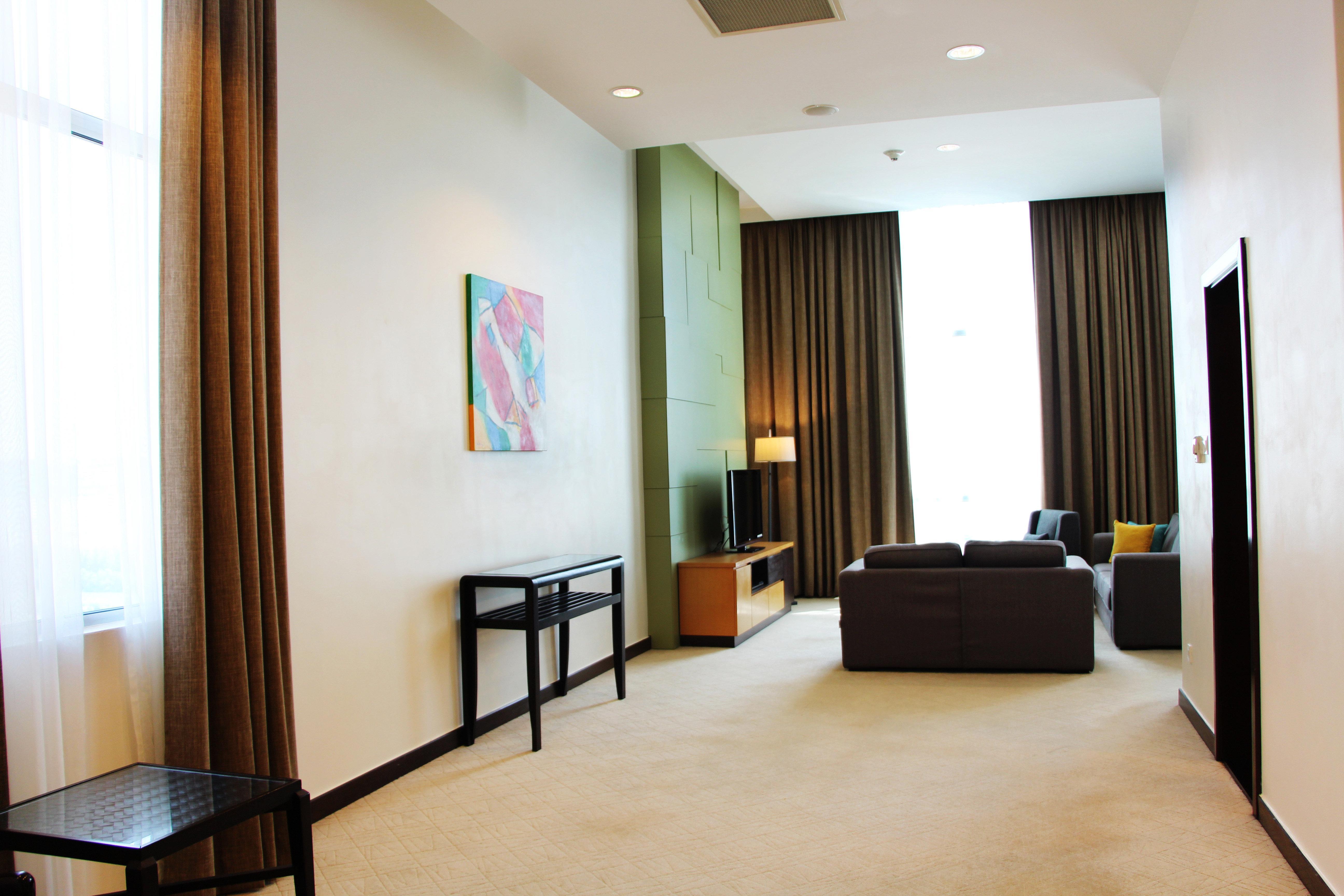 Holiday Inn Melaka By Ihg Esterno foto A suite at the hotel